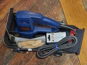 lot 198 image: RYOBI POWER PLANER