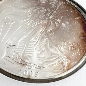 2005 SILVER American Eagle 1 oz Coin. Uncirculated With Rose Toning