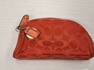 lot 195 image: Coach for Este Lauder Holiday 2010 Limited Edition Cosmetic Case