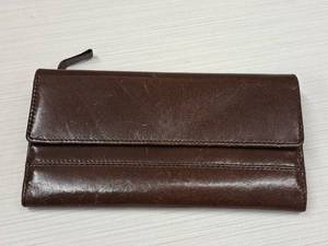 lot 276 image: Fossil Handcrafted Clutch