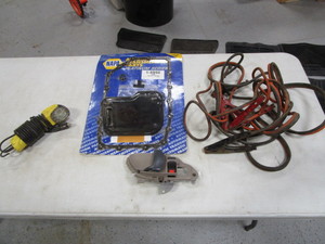 lot 63 image: Jumper Cables, 12v Light, Transmission Filter, Door Handle