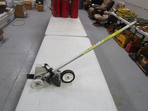 lot 89 image: Stihl Edger Attachment