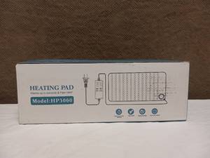 NEW ELECTRIC HEATING PAD