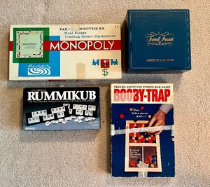 lot 109 image: Vintage Games Toys 1961 Monopoly Rummikub Booby-Trap Trivial Pursuit