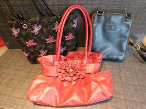 lot 196 image: (3) Womans Designer Hand Shoulder Crossbody Bags, Hand Embroidered Black Floral Bungee Cord Strap Pink Purple Green, Relic Black Crossbody, Red Leather() Gathered Scrunch Petal Handbag...