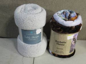 lot 109 image: Set of 2 Throws