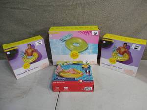 lot 158 image: 3 Pineapples and Baby Inflatable Floatys
