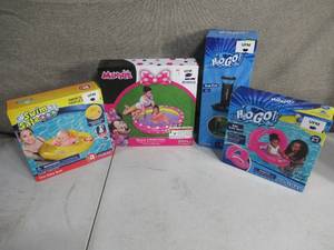 lot 172 image: Disney Pool Baby Seat Inflatables and Hand Pump Combo