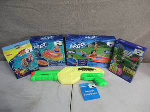lot 195 image: Water Slide-Junior Boat-Mickey Mouse Swim Vest-Water Balloon Launcher-Gargoyle Pump Blaster