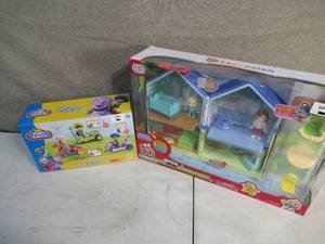 lot 238 image: Cocomelon & Dino Ranch Playset Combo