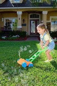 lot 152 image: Little Kids FUBBLES NO Spill Bubble Lawn Mower  Includes 4oz Non Tox Refill Solution  Automatic Bubble Blower Machine  Toddler Outdoor Bubble Toy, Orange