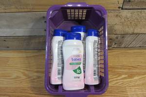 lot 5 image: Basket of Sunscreen Lotion for Babies