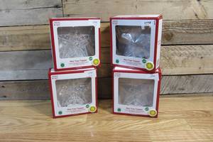 lot 13 image: Lot of Four Mini Tree Toppers