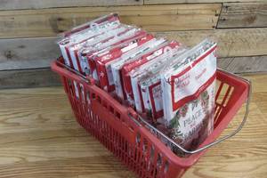 lot 19 image: Basket of Holiday Table Cloths