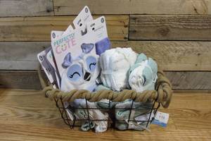 lot 115 image: Basket Full of Washcloths & Bath Time Sets