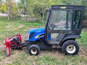 New Holland TZ25DA Commercial Tractor With V-Plow