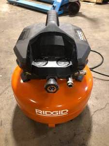 lot 3 image: RIDGID 6 Gal. Portable Electric Pancake Air Compressor Customer Returns See Pictures