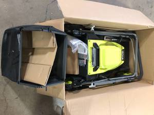 lot 29 image: RYOBI 20 in. 13 Amp Electric Walk Behind Lawn Mower   Customer Returns See Picture