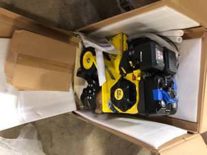 lot 42 image: Champion Power Equipment 22 in. 212cc 4-Stroke Gas Garden Front Tine Tiller with Forward and Reverse  Customer Returns See Pictures