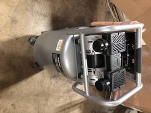 lot 46 image: Husky 20 Gal. Vertical Electric-Powered Silent Air Compressor Customer Returns See Pictures