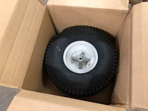 lot 34 image: MTD Genuine Factory Parts 20 in. x 8 in. Rear Tractor Wheel for Troy-Bilt Cub Cadet and Craftsman Lawn and Garden Tractors Customer Returns See Picture