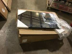 lot 16 image: Litton Lane 32 in. x 18 in. Rectangle Framed Black Wall Mirror with Thin Minimalistic Frame  Customer Returns See Pictures