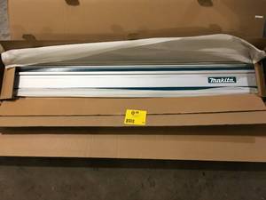 lot 28 image: Makita 55 in. Plunge Saw Guide Rail  Customer Returns See Pictures
