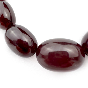 Graduated Deep Burgundy Synthetic Bead Necklace.