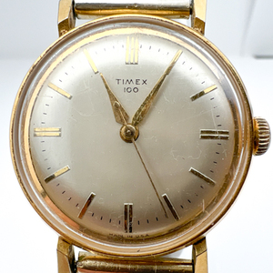 Timex 100 VINTAGE yellow stainless steel and base metal Mechanical Watch. Starts up when wound.
