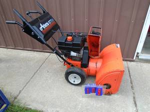 lot 109 image: Ariens 724 snow blower with electric start. Tested & works. As shown.