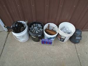 lot 111 image: Qty of 4 pails of misc. pipemetal & welding helmet. As shown.
