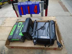 lot 114 image: Flat of batteries & chargers. Condition unknown. As shown.