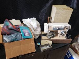 Universal Sewing Machine and Supplies