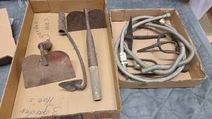 Small selection of garden tools and plumbing connections