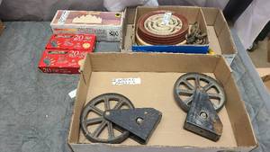 Vintage and antique tools and pulleys with old fashioned heating elements
