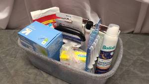 Tote of Bathoom goods ready for use.