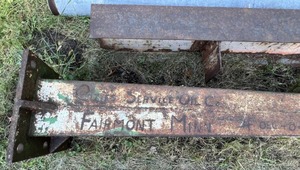Two Heavy Steel Items Including Vintage Gas Station Sign Post With Fairmont Minns Written On It Measures 14x18 At Base 4x8 At Top By 141 T I Beam Measures 12T x &W x 128 12  (Bring Large Truck Or Trailer & Help To Load)