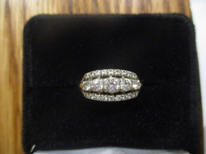 Absolutely Stunning Engagement and Wedding Ring. The ring is 14k white gold with 23 diamonds with 3  row..It is 1.25cttw Clarity S12 Color H-1.The Platinum diamond band is 9 single cut 14 cttw Diamonds  Clarity S11 and Color G