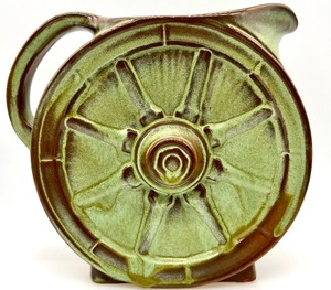 lot 61 image: Vintage Frankoma Pottery - Prairie Green Pitchers, Tea Pot, Wagon Wheel Salt & Pepper Shakers