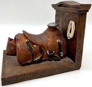 lot 69 image: Vintage DEZINE Western Bookends, The Calling of Dan Matthews by Harold Bell Wright Book, Frankoma Pottery Boot Vase