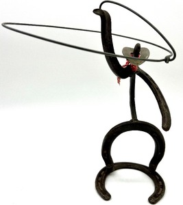 lot 77 image: Unique Horse Shoe Sculpture of a Cowboy  Vintage Rawhide Teepee Plug In Lamp