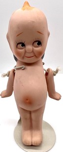 lot 110 image: Vintage ENESCO Corp KEWPIE Ceramic Dolls with Miniature artwork