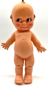 lot 111 image: Vintage CAMEO 74 Marked KEWPIE Doll with THE KEWPIES BOOK