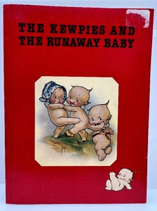 lot 114 image: Reproduction KEWPIE Doll JESKO Marked Doll, Book, Stickers, and Cardboard Ornaments