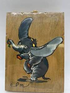 lot 205 image: MCM Glass Elephant Cigar Ashtray & Painted Dumbo on Board - Sealed