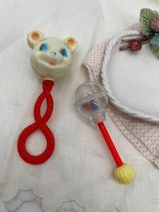 lot 190 image: Baby Girls Room Decor - Linen Dresses, Kids LP Record, Rattles, Trinket Dish, Besse Peace - Gutmann Heavens Gift Picture