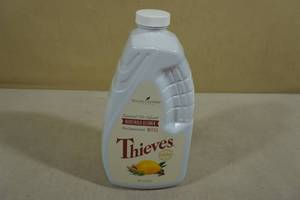lot 30 image: Young Living Essential Oil Infused Thieves Household Cleaner Refill 64 fl oz