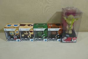 lot 152 image: 4 Hasbro Marvel Mini Muggs and Yoda Bobble Head