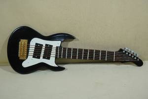 lot 250 image: Vintage Bakelite Electric Guitar Wall Decoration