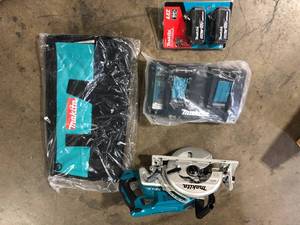 Makita 18V X2 LXT 5.0Ah Lithium-Ion (36V) Brushless Cordless Rear Handle 7-14 in. Circular Saw Kit Customer Returns See Pictures